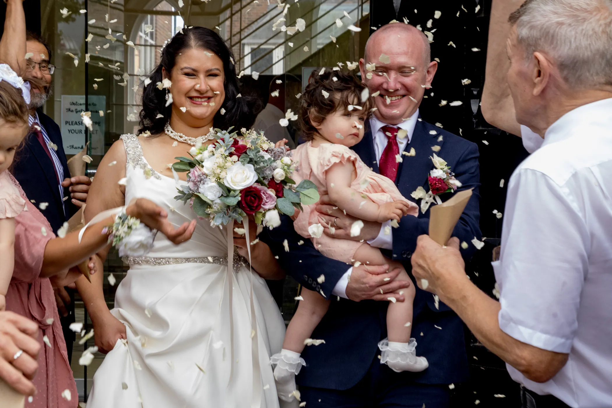 Confetti throw outside St Albans registry office, photographed by Josie Kavanagh
